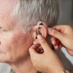 Elder person using hearing Aids