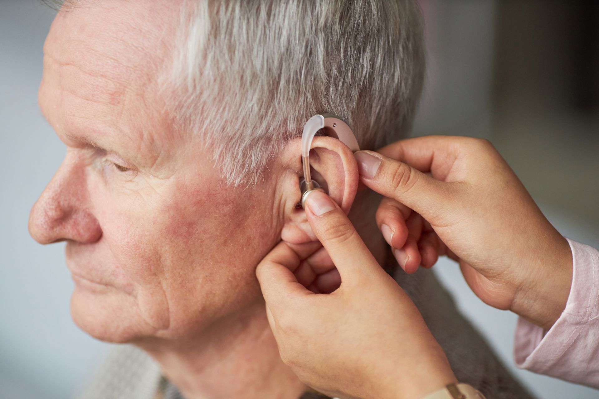 Elder person using hearing Aids